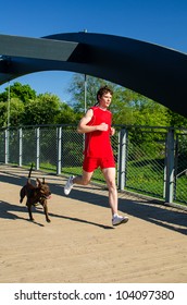 Sportsman and dog running outdoors