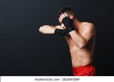 Sportsman Muay Thai Man Boxer Stance Ad Elbow Punch At Black Background