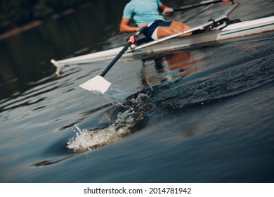 Sportsman Single Scull Man Rower Rowing At Competition Boat. Close Up Paddle Splash Water