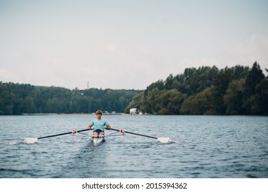 Sportsman Single Scull Man Rower Rowing On Boat.