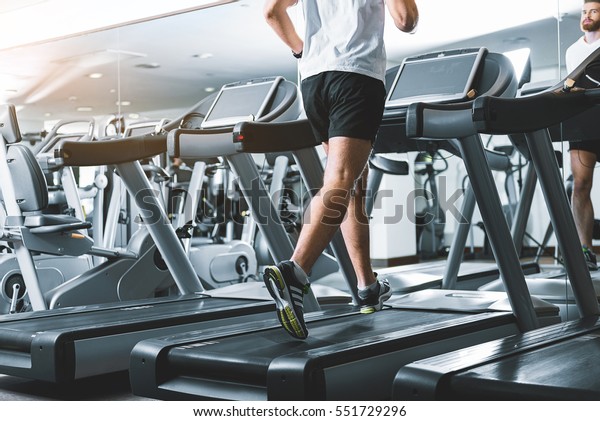 Sportsman using jogging\
track for heath