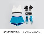 Sportwear fashion outfit flatlay still life isolated shot from above on grey background