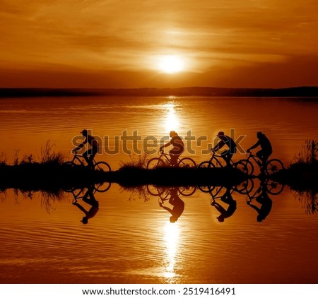 Similar – Image, Stock Photo 4 sporty cyclists on a bridge