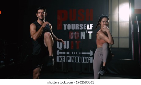 Sporty Couple Cardio Exercise Burning Calorie HIIT And Squat In Fitness Gym Fit Body Healthy Lifestyle Athlete Muscle Building Strong Concept.