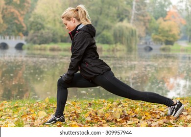 Sporty Girl Cooling Down After Workout In Park