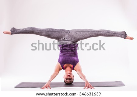Sporty girl doing yoga