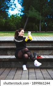 Sporty Girl Taking A Self Portrait Photography At Park.