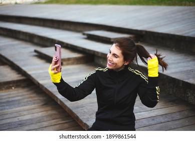 Sporty Girl Taking A Self Portrait Photography At Park.