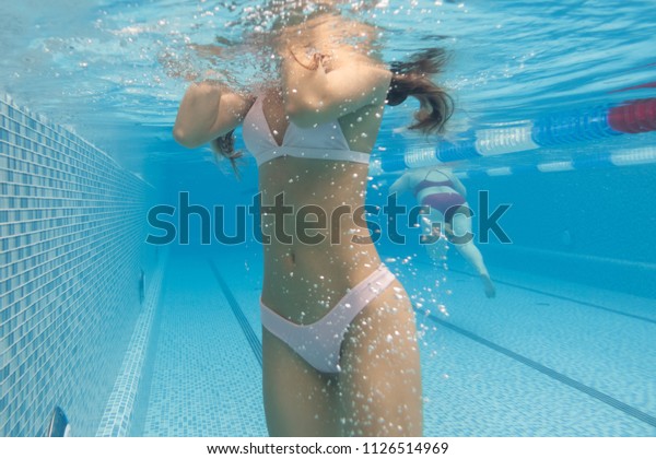Fat girl swimming