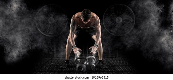 Sporty man workout with kettlebell. Sports banner. Horizontal copy space background