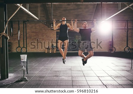 Similar – Image, Stock Photo Muscular man doing chin-ups