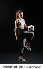 Sporty Teenage Girl With Ball On Black Background