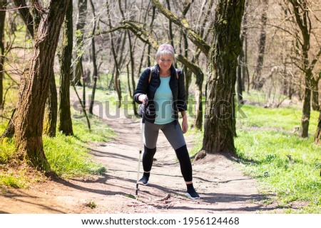 Similar – Active and sporty woman runner in autumn nature