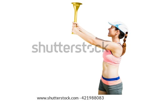 Sporty woman holding Olympic torch