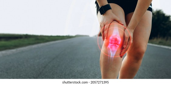 Sporty woman who suffered a knee accident during the run.  
 Joint  problems and tendon inflammation.   - Shutterstock ID 2057271395