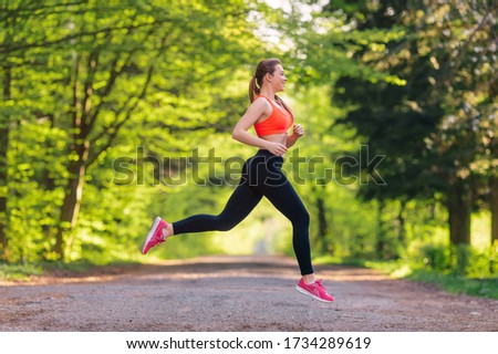Similar – Image, Stock Photo Happy woman jogging with her smartphone