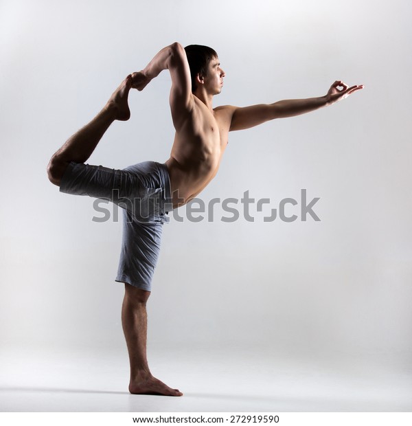 Sporty Young Man Working Out Yoga Stock Photo (Edit Now) 272919590