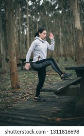 Sporty Young Woman Doing Toe Taps During Outdoor Hiit Workout.