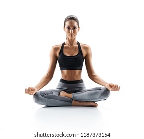 Sporty young woman doing yoga practice isolated on white background. Concept of healthy life and natural balance between body and mental development. Full length - Shutterstock ID 1187373154