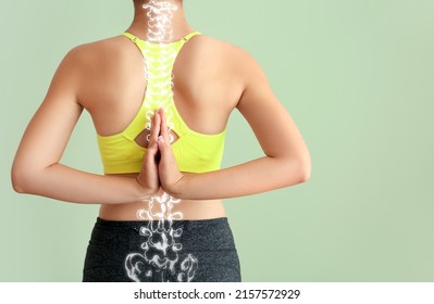 Sporty Young Woman With Healthy Spine On Color Background