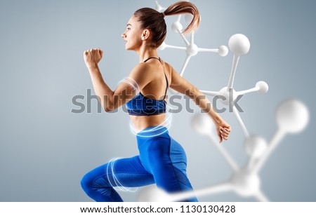 Sporty young woman runing and jumping near molecules. Metabolism concept.