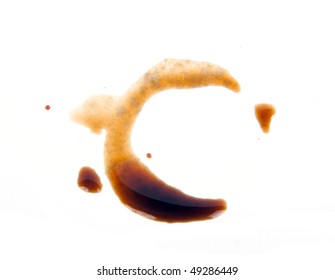 Spot From Bottle Of Soy Sauce Isolated On White