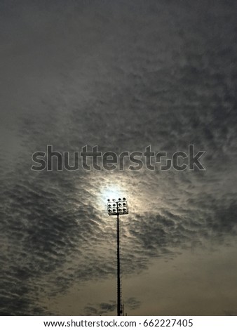 Spotlight with cloud of blue sky