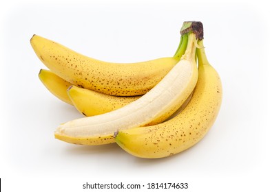 Spotted bananas. Ripened Cavendish bananas isolated on white with shadows - Shutterstock ID 1814174633