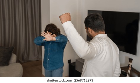 Spouses are arguing, husband is physically abusing wife. Concept of family disputes problems 