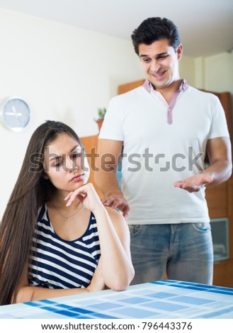 Spouses trying to put things right after bad argument indoors