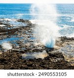 Spouting Horn Blowhole Gushing Through Open Lava Tube, Spouting Horn Beach Park, Kauai, Hawaii, USA