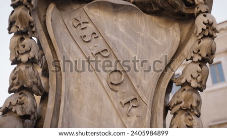 Spqr latin text on an artistic creation in the capital of Italy