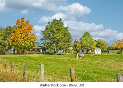 Sprawling acreage of pastures surround a horse farm in Kentucky, USA.