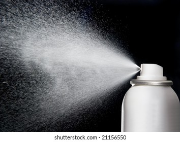 spray aerosol on black background