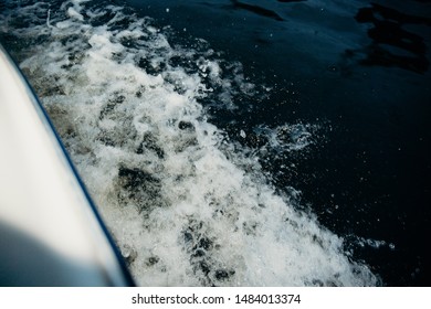 The Spray Off Of The Back Of An Old Bass Fishing Boat. Boat Spray I The River