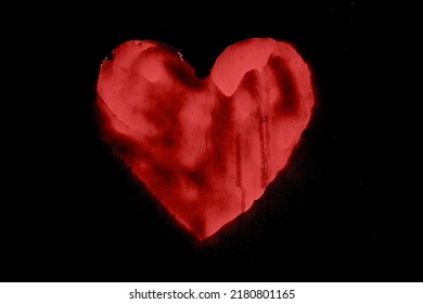 Spray Paint red Heart isolated on black Background. Symbol of Love for Happy Women's, Mother's, Valentine's Day, Birthday greeting card. Street style. painted heart sign on dark backdrop