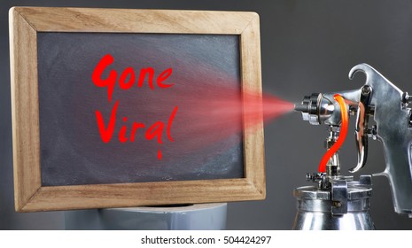 Spray Painting A Red Gone Viral Sign.