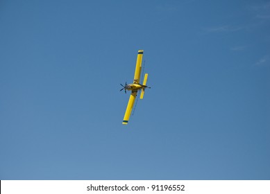 A Spray Plane performs a nearly 90 degree banking turn