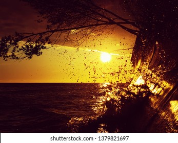 Spray waves at sunset. 