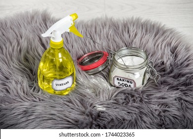 Spray White Vinegar Dilution With Water And Baking Soda (Sodium Bicarbonate) In Glass Jar. Long Hair Fur Carpet Cleaning And Stain Removal, Removing Smell Concept. Natural Home Cleaners.