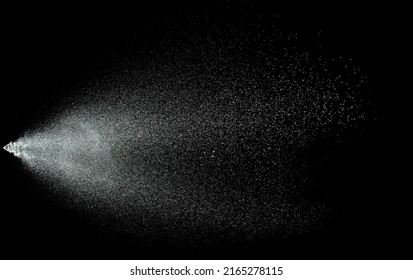 Sprayed water. Splashes and drops of water isolated on black background.
