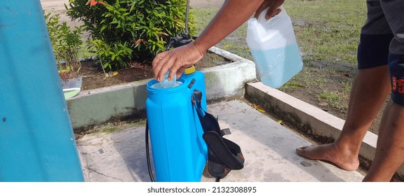 Spraying Disinfectant By The Covid 19 Task Force Outside The Room