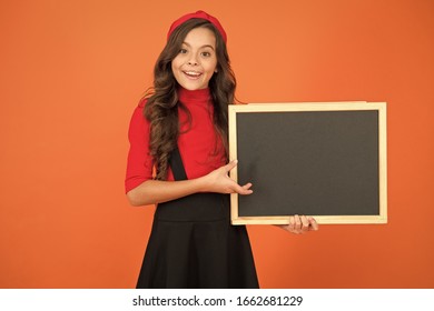 Spread Your Publicity. Happy Kid Hold Blank Blackboard For School Publicity. Little Child Smile With Tidy Publicity Board. Advertising And Marketing. Publicity Agency, Copy Space.