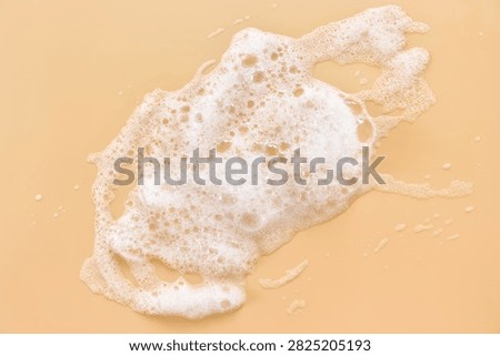 Spreading foam patch with lacy edges on orange