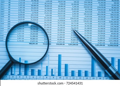 Spreadsheet bank accounts accounting finance forensics with magnifying glass and pen. Concept for financial fraud investigation, audit and analysis. - Shutterstock ID 724541431