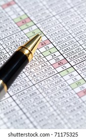 Spreadsheet And Column Of Numbers From A Business Sales Region