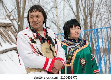 Spring, 2018 - Krasny Yar, Primorsky Region - National Udege Holiday Vakchini. The Shaman Performs The Rite Of Offering To The Spirits By The Fire.