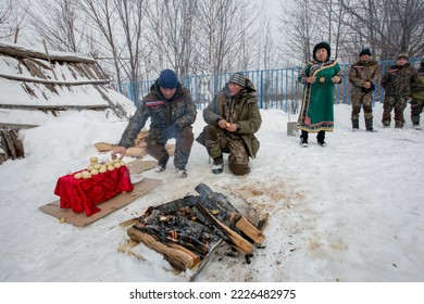 Spring, 2018 - Krasny Yar, Primorsky Region - National Udege Holiday Vakchini. The Shaman Performs The Rite Of Offering To The Spirits By The Fire.