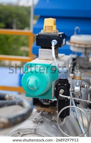 Spring and air-operated actuators control the opening and closing of liquids within factory pipes, providing precise, efficient, and automated flow management in industrial process systems.