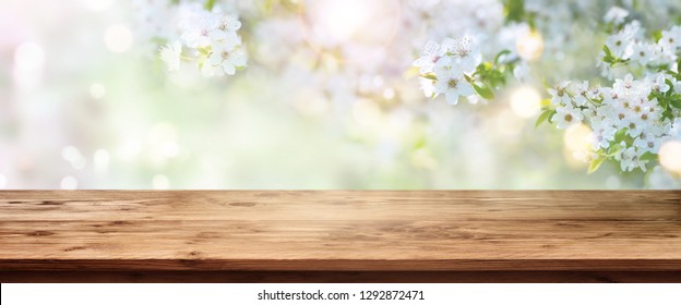 Spring Blossoms With Wooden Table For A Background Decoration